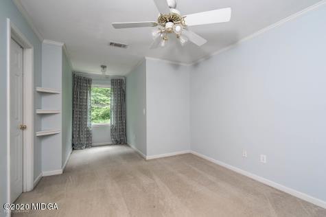 113 Hampton Ridge Road Macon, GA 31220 - Photo 28 of 29 wooden floor in an empty room with a window