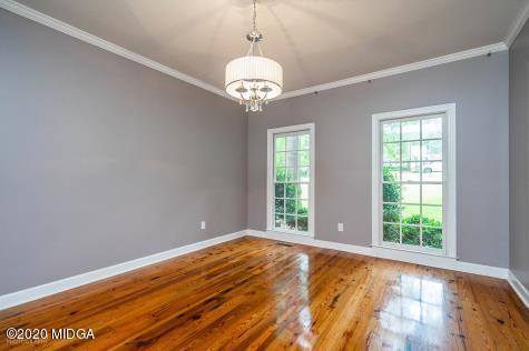 113 Hampton Ridge Road Macon, GA 31220 - Photo 5 of 29 a view of an empty room with a window