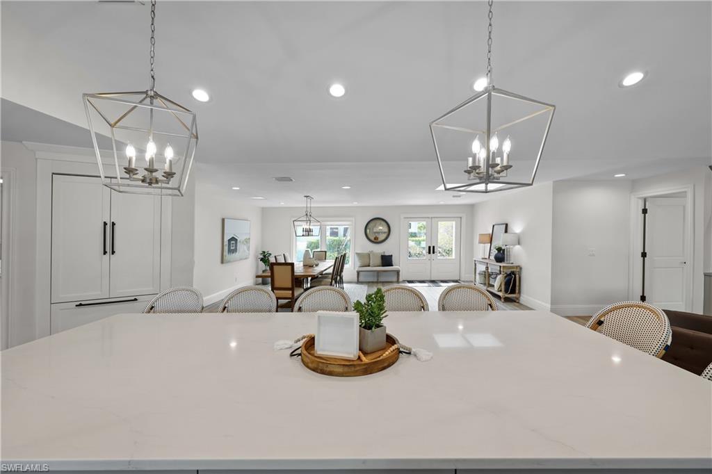 4611 Crayton Road Naples, FL 34103 - Photo 11 of 38 a view of a room with gym equipment