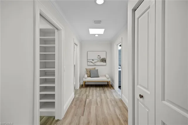 a bathroom with a double vanity sink and mirror