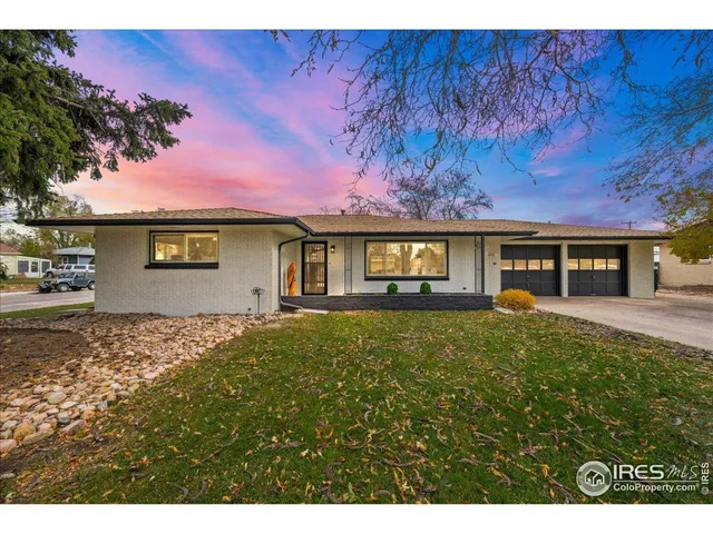a view of a house with a garden