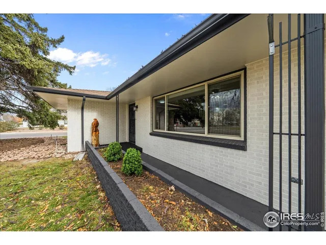 a view of back yard of the house and front of a house