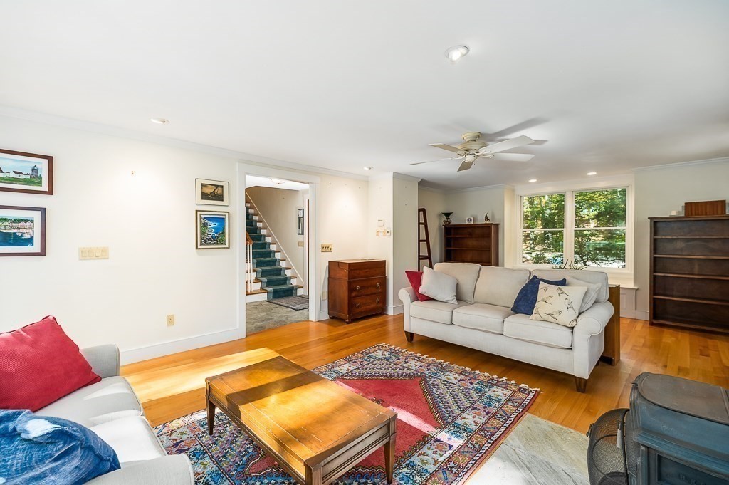 8 Mill Road Ipswich, MA 01938 - Photo 11 of 38 a living room with furniture and a large window