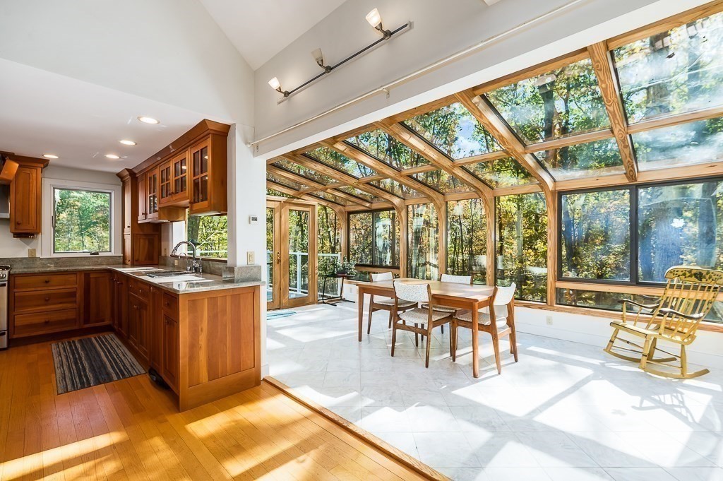 8 Mill Road Ipswich, MA 01938 - Photo 15 of 38 a living room with large windows