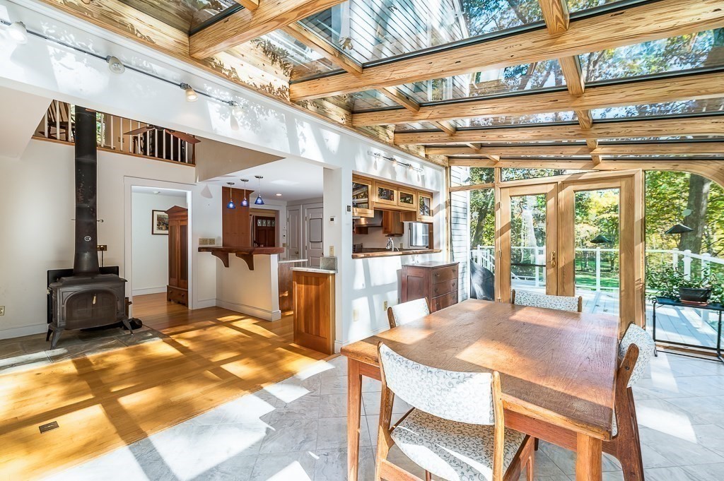 8 Mill Road Ipswich, MA 01938 - Photo 16 of 38 a view of a dining hall with a large window