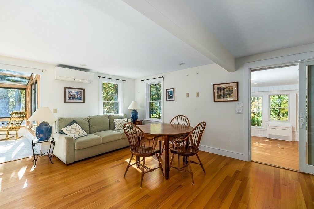 8 Mill Road Ipswich, MA 01938 - Photo 19 of 38 a living room with furniture and wooden floor