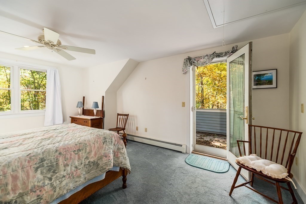8 Mill Road Ipswich, MA 01938 - Photo 27 of 38 a bedroom with a bed and a window