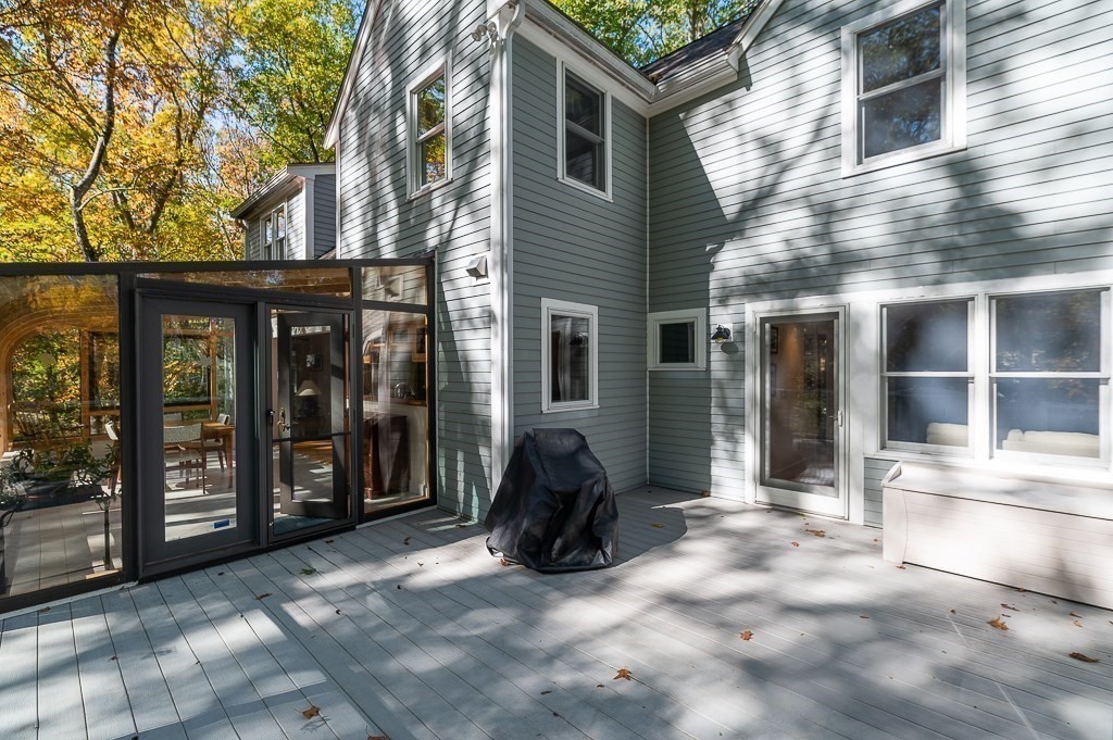 8 Mill Road Ipswich, MA 01938 - Photo 29 of 38 a view of a house with a barbeque and trees