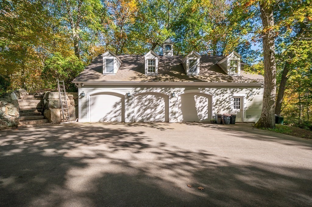 8 Mill Road Ipswich, MA 01938 - Photo 35 of 38 a view of a water fountain with large trees