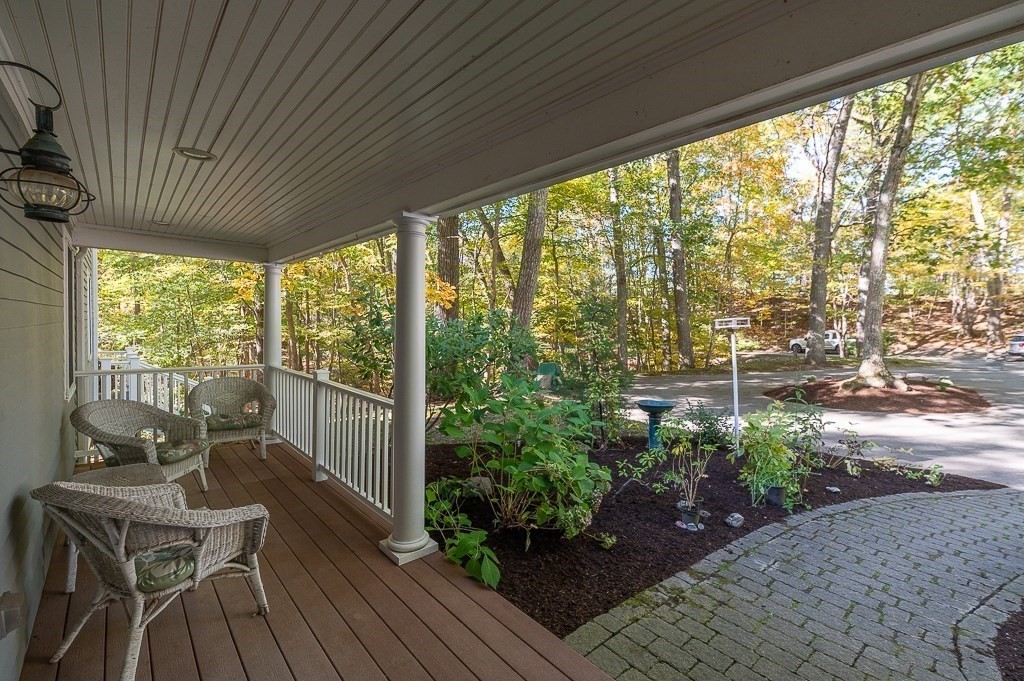8 Mill Road Ipswich, MA 01938 - Photo 5 of 38 a house with wooden floor outdoor seating and yard