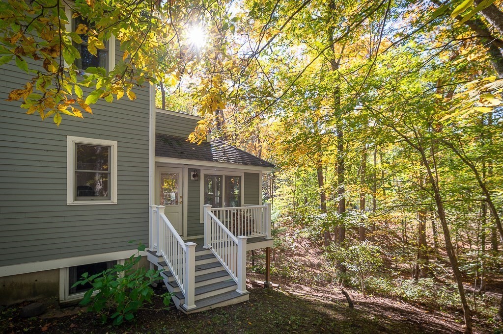 8 Mill Road Ipswich, MA 01938 - Photo 6 of 38 a view of a house with a yard