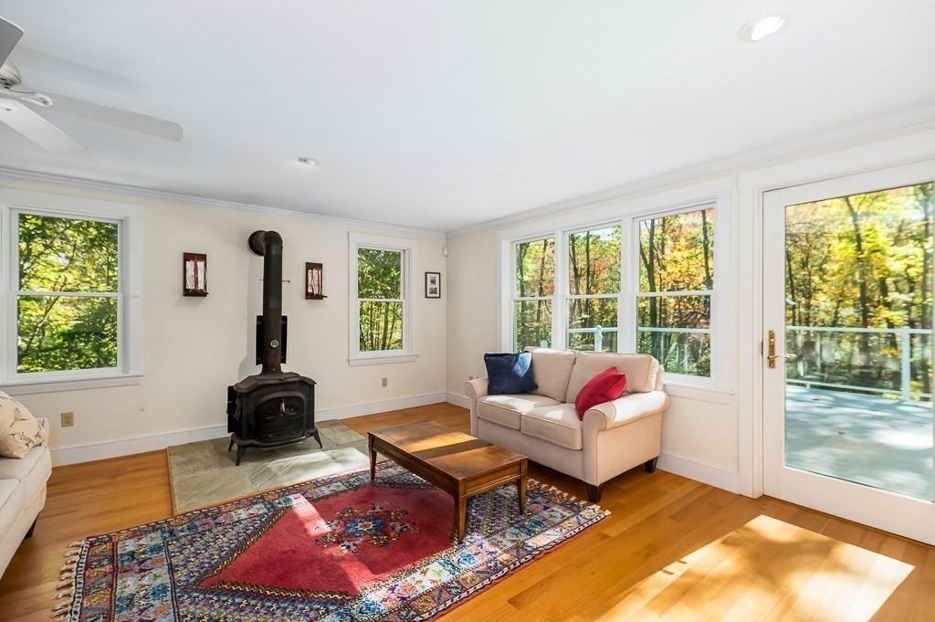 8 Mill Road Ipswich, MA 01938 - Photo 10 of 38 a living room with furniture and a large window