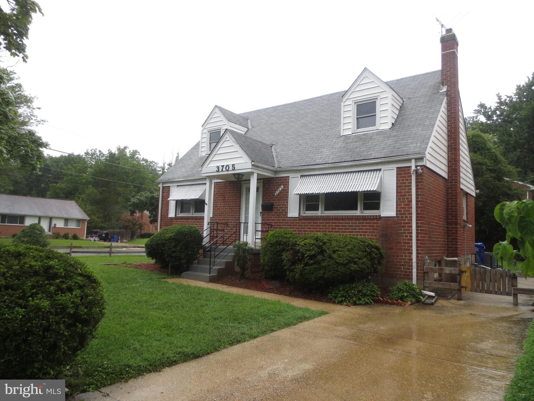 3705 May Street Silver Spring, MD 20906 - Photo 1 of 27 a front view of a house with a yard