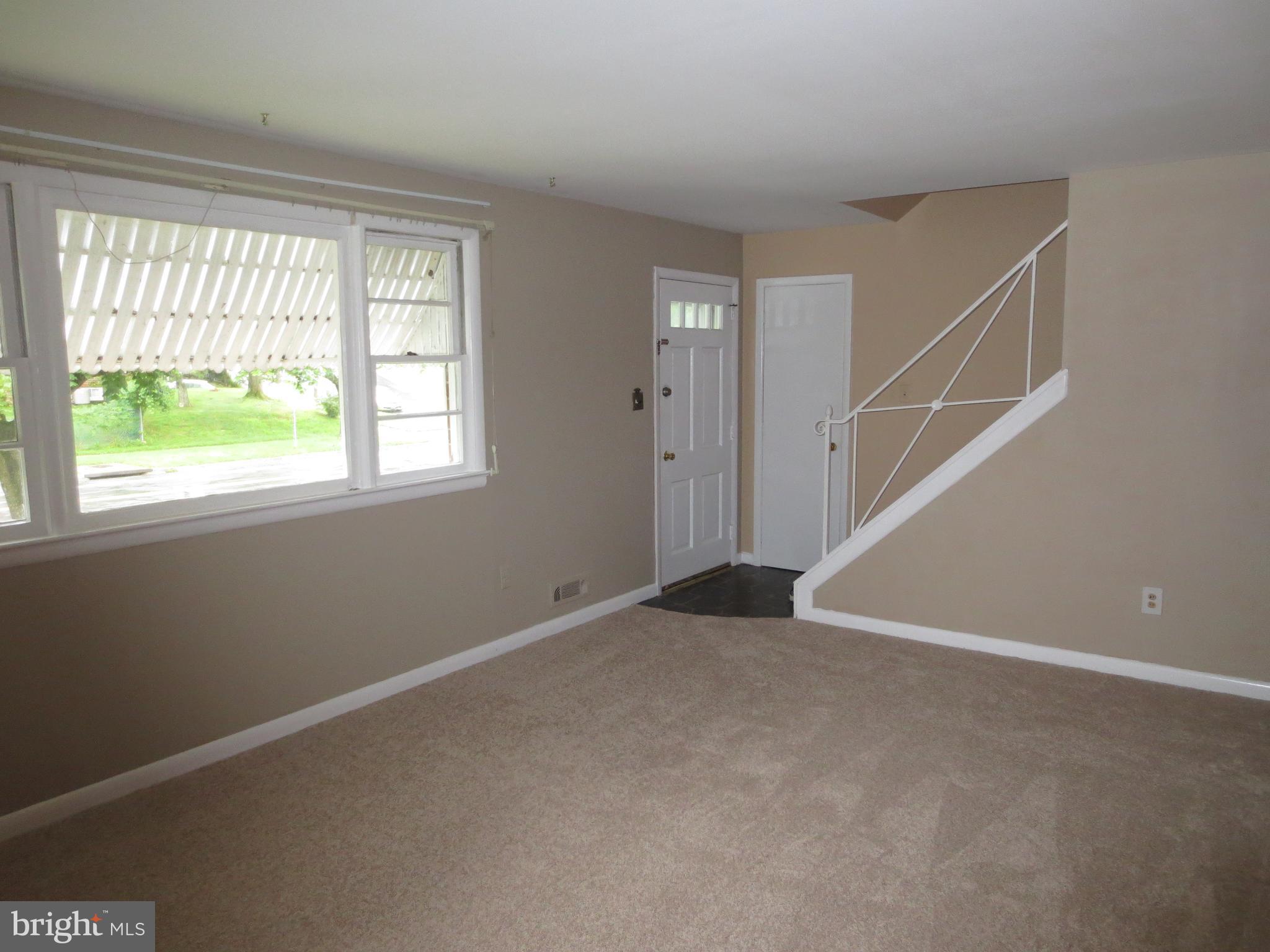 3705 May Street Silver Spring, MD 20906 - Photo 2 of 27 a view of an empty room with a window