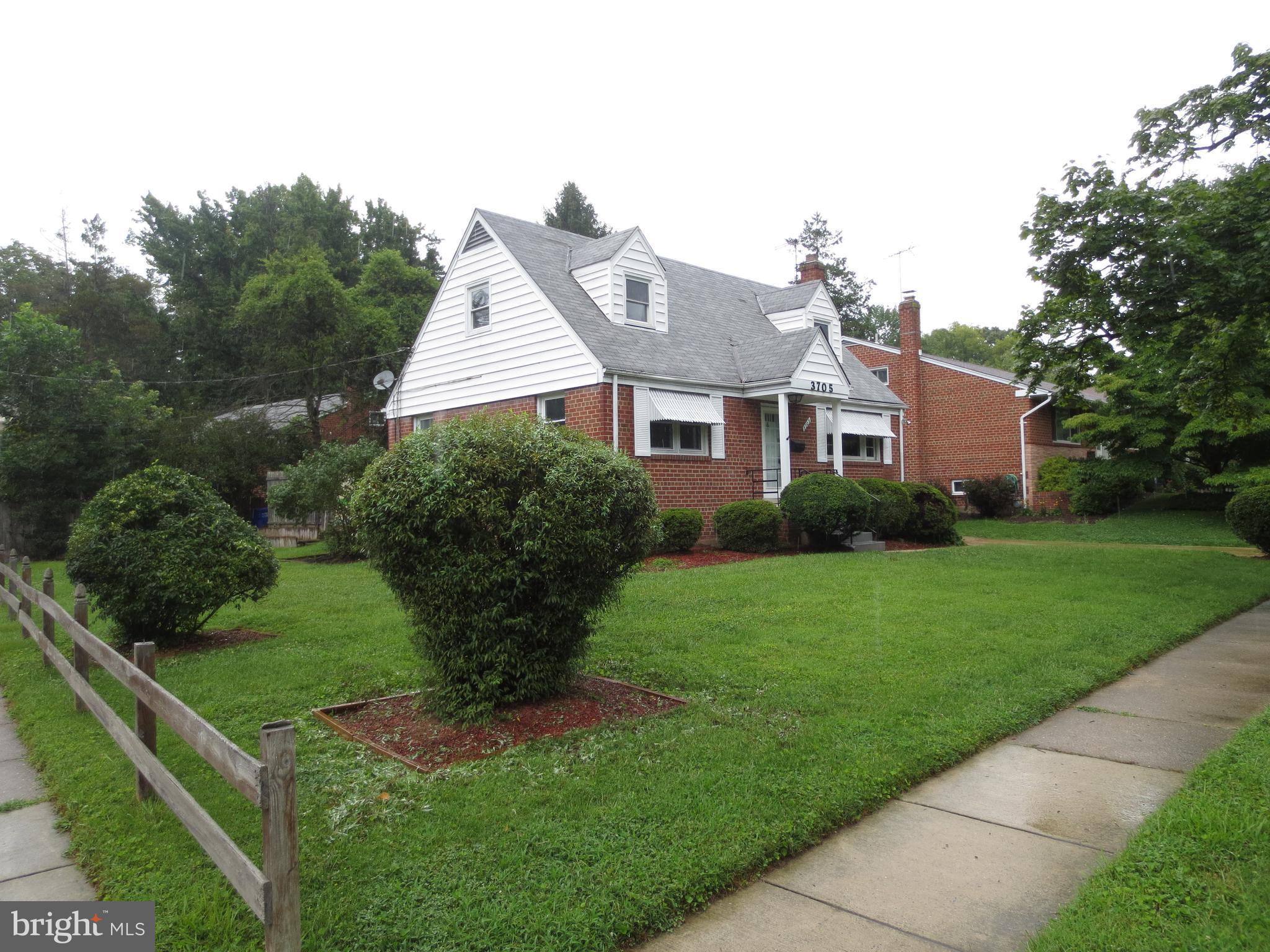 3705 May Street Silver Spring, MD 20906 - Photo 24 of 27 a front view of a house with a yard