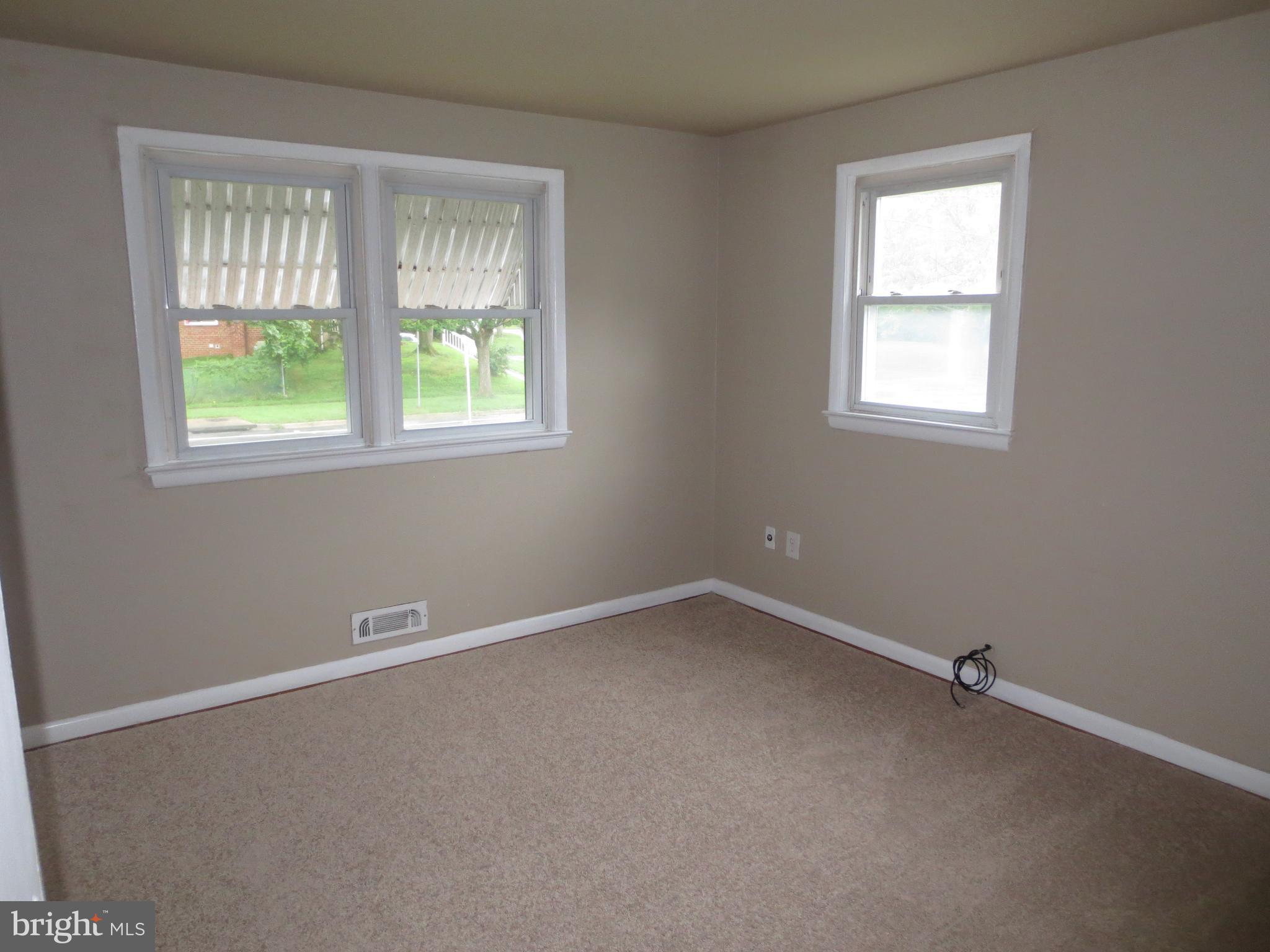 3705 May Street Silver Spring, MD 20906 - Photo 8 of 27 an empty room with a window