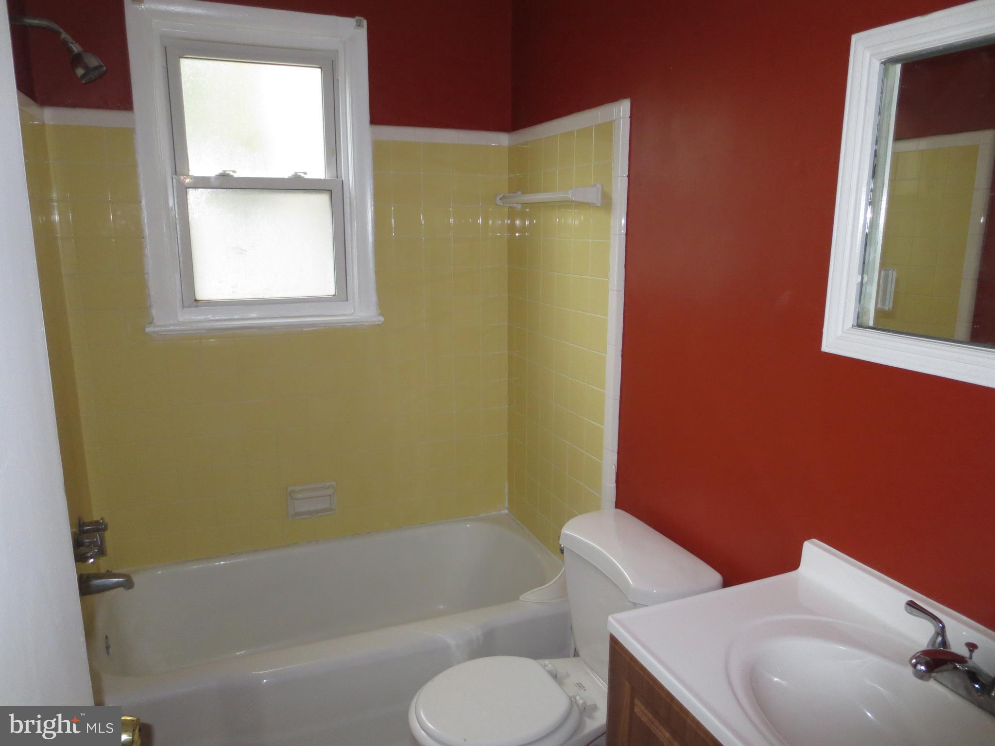 3705 May Street Silver Spring, MD 20906 - Photo 9 of 27 a bathroom with a toilet sink and tub