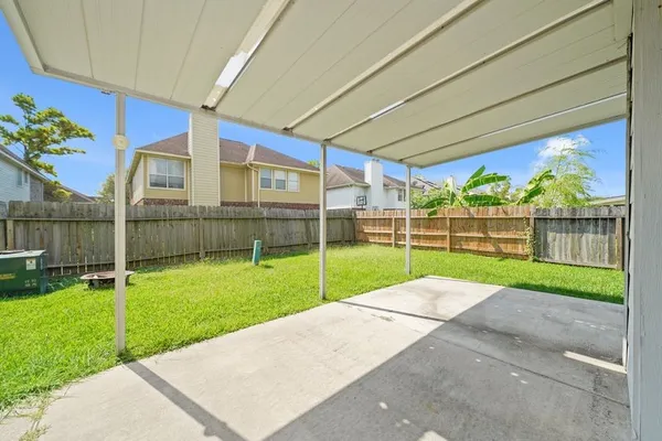 a view of backyard with green space