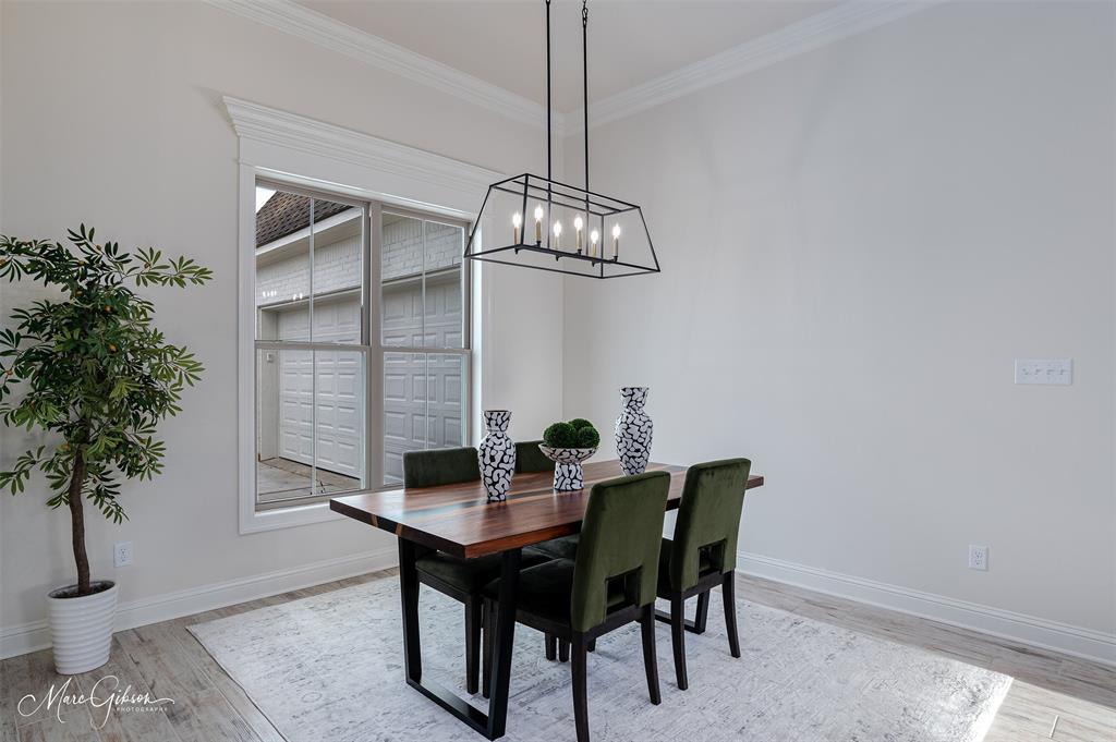 175 Sitka Loop Haughton, LA 71037 - Photo 11 of 28 a dining room with a table and chairs