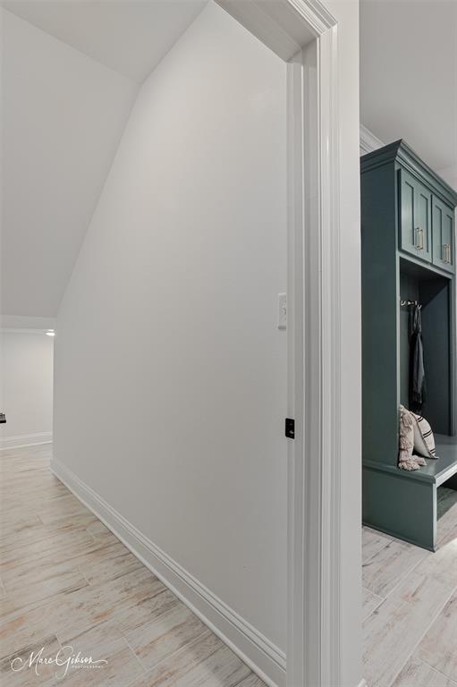 175 Sitka Loop Haughton, LA 71037 - Photo 16 of 28 a view of a hallway with wooden floor and a living room
