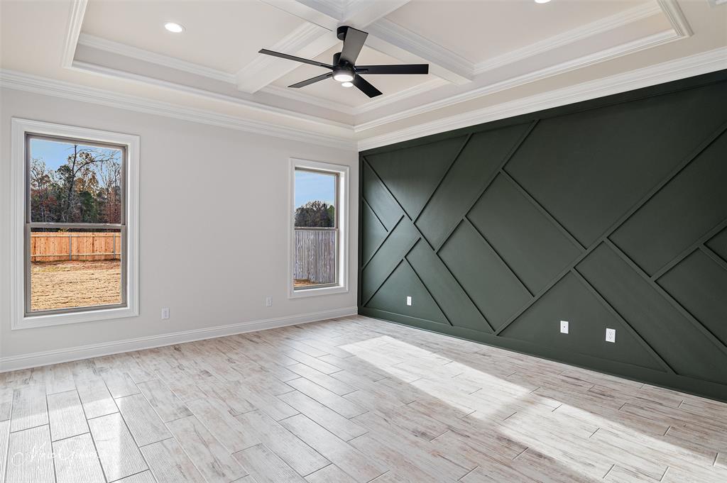 175 Sitka Loop Haughton, LA 71037 - Photo 17 of 28 a view of an empty room with a window and wooden floor