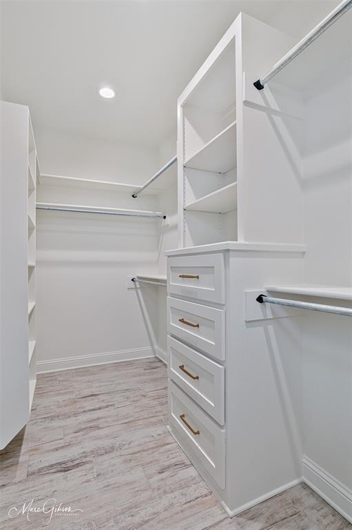 175 Sitka Loop Haughton, LA 71037 - Photo 18 of 28 a view of walk in closet with empty racks