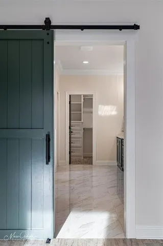 a room with a dresser and a sink