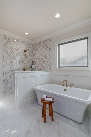 a view of a room that has a bed in it