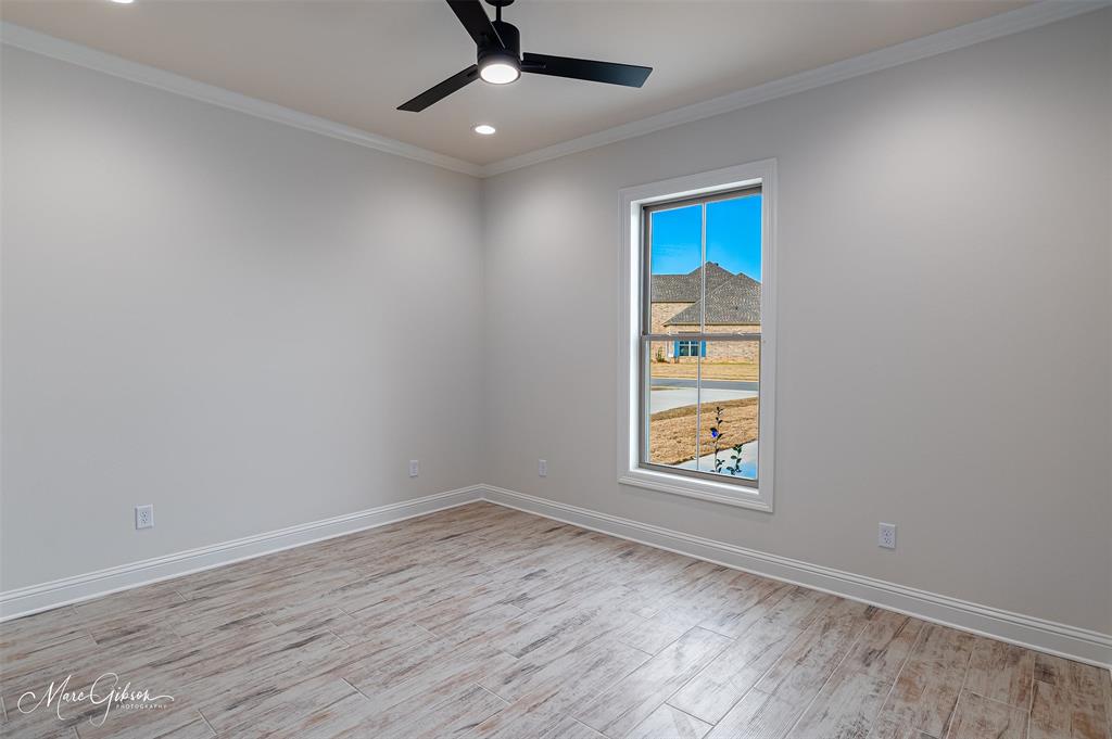 175 Sitka Loop Haughton, LA 71037 - Photo 24 of 28 an empty room with wooden floor closet and windows