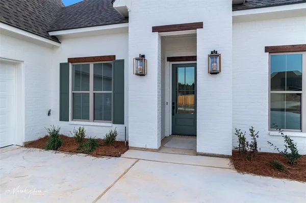a view of a entryway door front of house