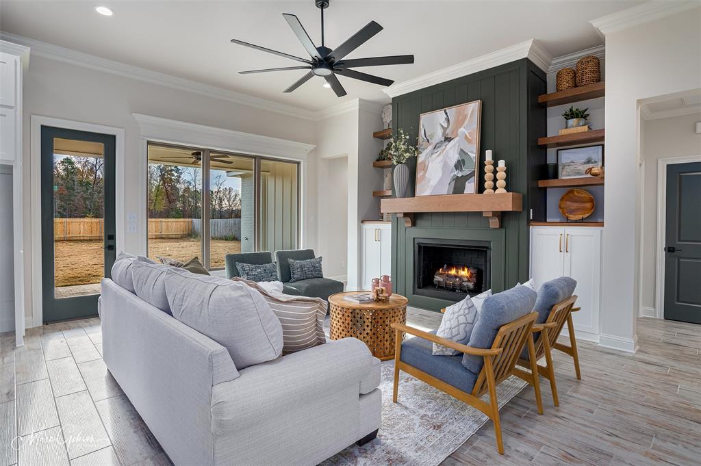 175 Sitka Loop Haughton, LA 71037 - Photo 4 of 28 a living room with furniture and a fireplace