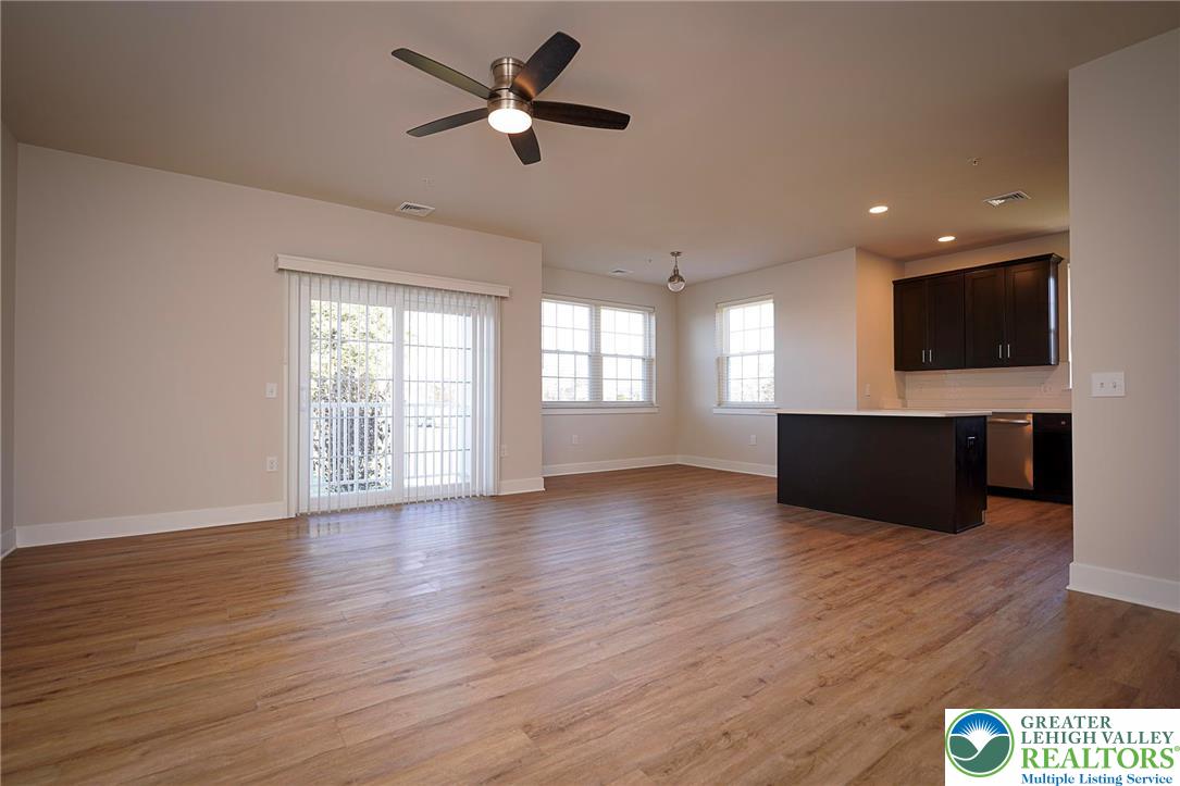 1763 Madison Avenue, Unit 201 Bethlehem, PA 18017 - Photo 5 of 20 a living room with furniture and a flat screen tv