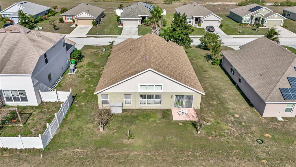 1153 Legatto Loop Dundee, FL 33838 - Photo 43 of 48 an aerial view of a house