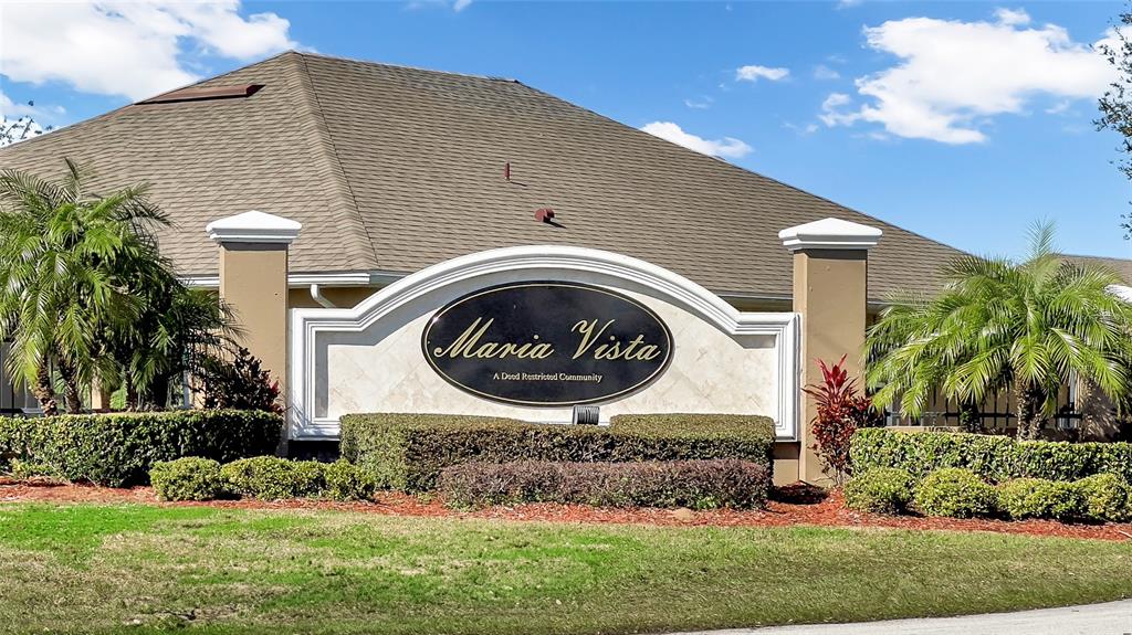 1153 Legatto Loop Dundee, FL 33838 - Photo 47 of 48 a front view of a house with garden