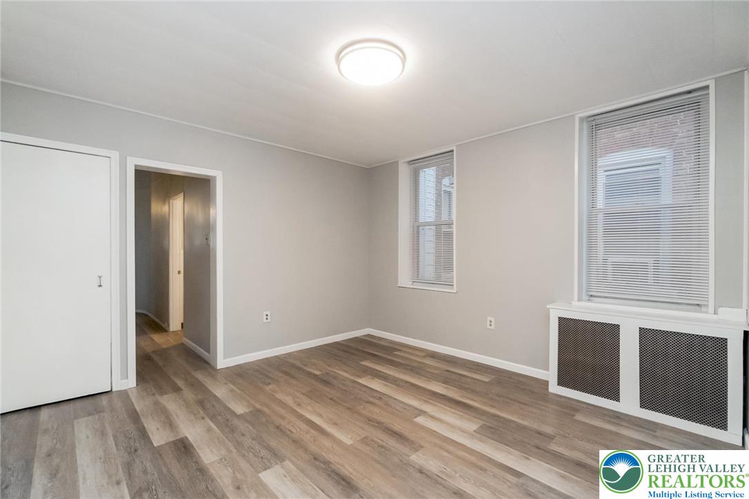 421 Center Street Jim Thorpe, PA 18229 - Photo 12 of 34 a view of an empty room with wooden floor and a window