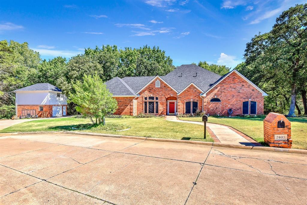 a front view of house with a yard