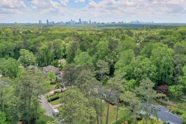 a view of a field with an trees