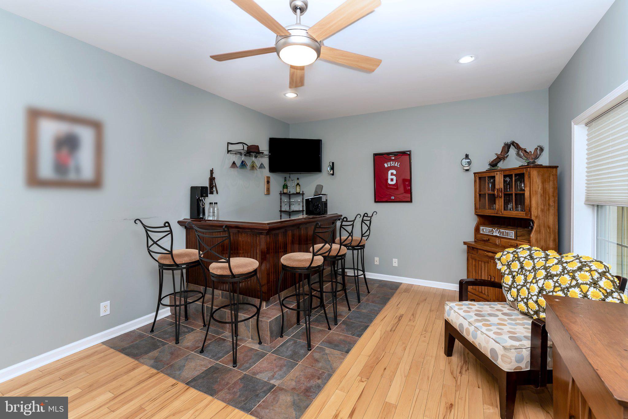 309 East Weymouth Road Newfield, NJ 08344 - Photo 5 of 10 Charming home bar with inviting ambiance.