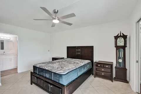 a living room with a bed and furniture