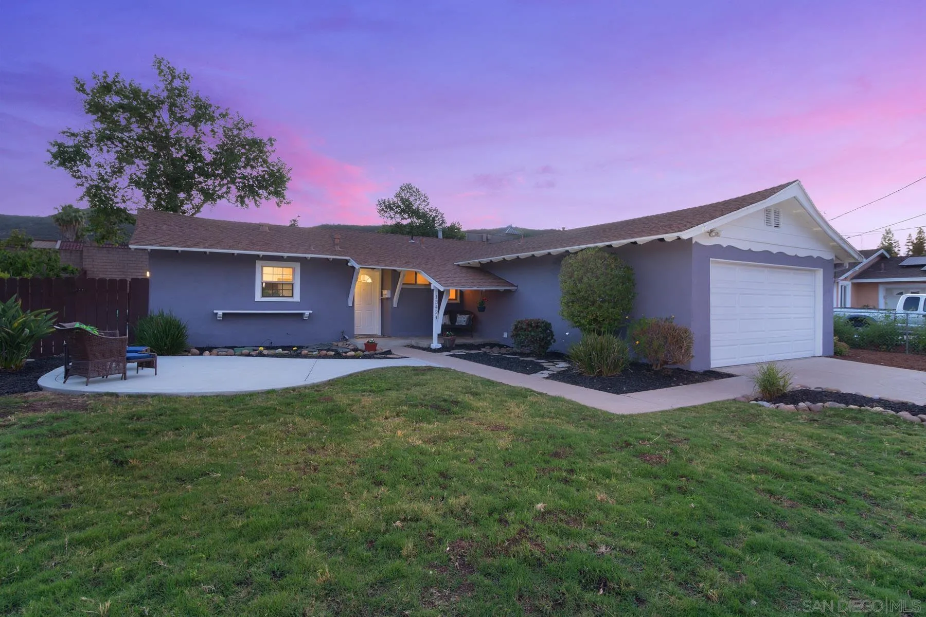 13424 Powers Road Poway, CA 92064 - Photo 1 of 24 a front view of a house with a garden and plants