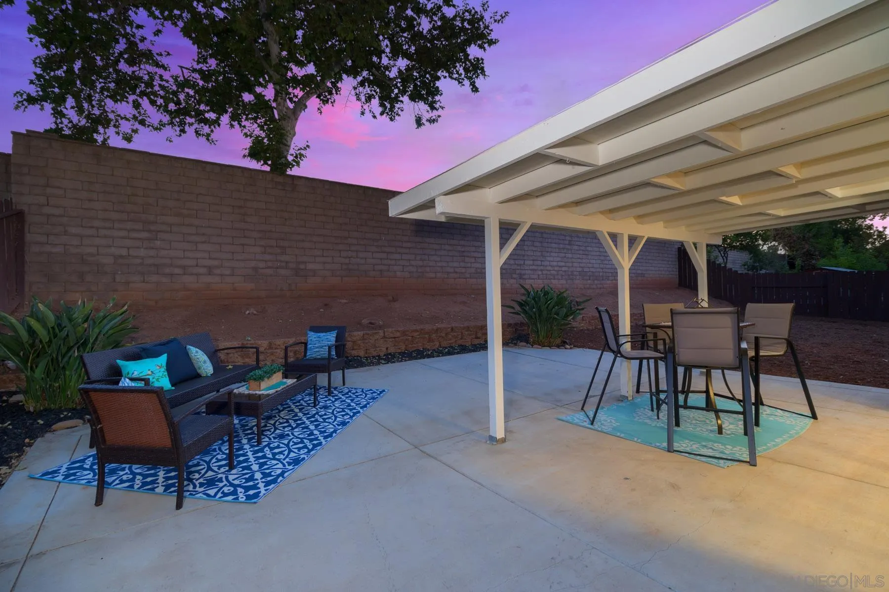 13424 Powers Road Poway, CA 92064 - Photo 18 of 24 a backyard view with a seating space