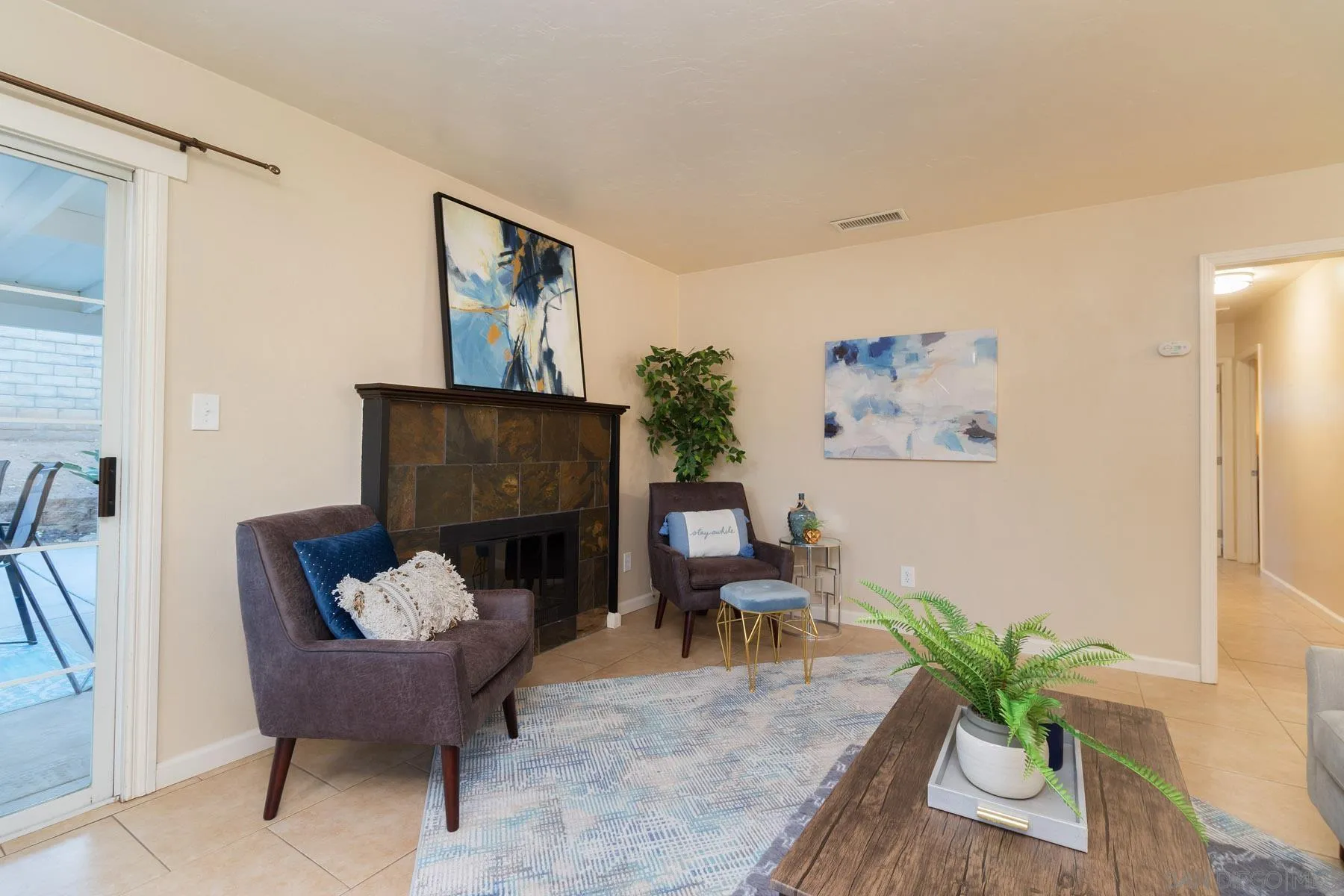 13424 Powers Road Poway, CA 92064 - Photo 4 of 24 a living room with furniture and a potted plant
