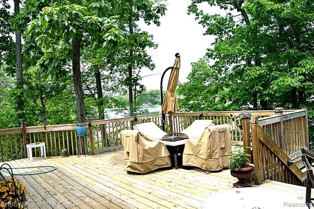 1465 Remsing Street Hartland, MI 48353 - Photo 21 of 27 Expansive rear deck