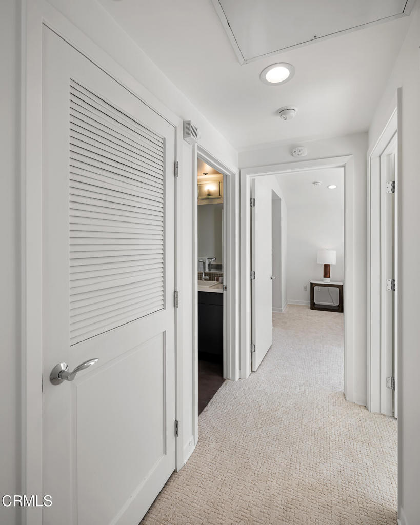 159 West Green Street, Unit 502A Pasadena, CA 91105 - Photo 15 of 40 a view of a hallway with an entryway and closet area
