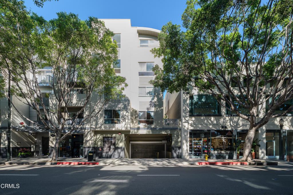 159 West Green Street, Unit 502A Pasadena, CA 91105 - Photo 2 of 40 a building with trees in front of it