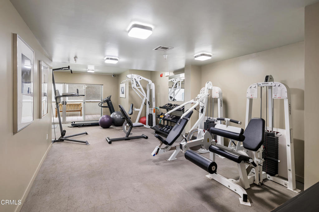 159 West Green Street, Unit 502A Pasadena, CA 91105 - Photo 29 of 40 a view of a room with gym equipment