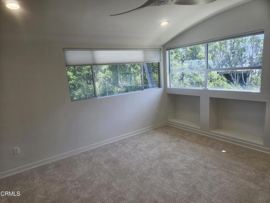 159 West Green Street, Unit 502A Pasadena, CA 91105 - Photo 44 of 50 an empty room with large windows