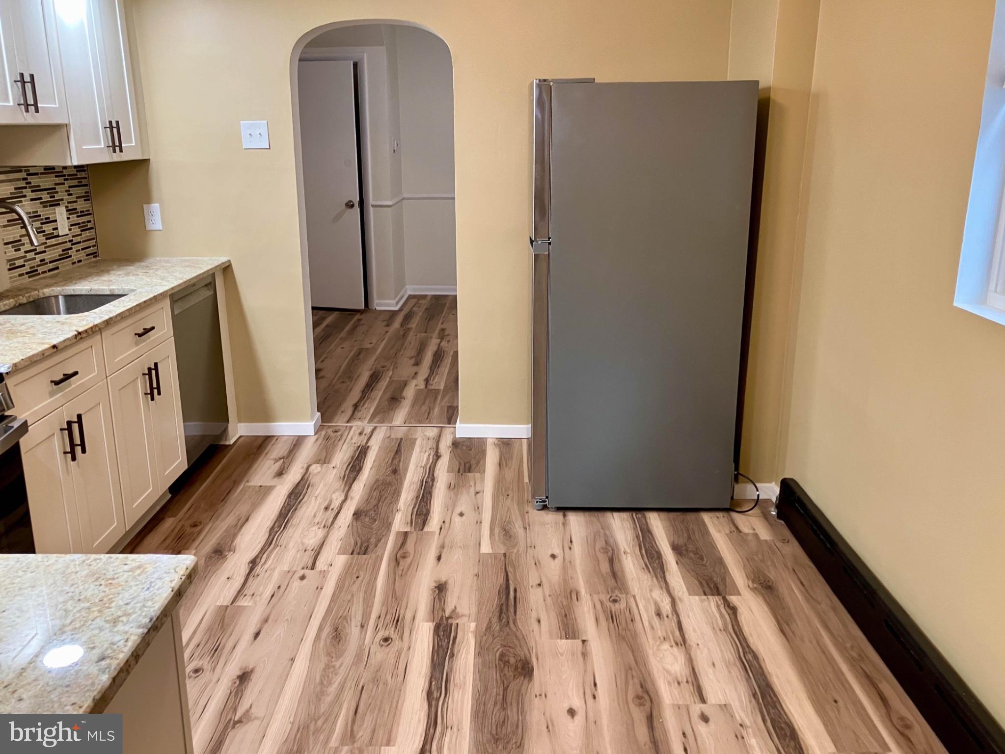 543 North Simpson Street Philadelphia, PA 19151 - Photo 6 of 11 Modern kitchen with sleek finishes.