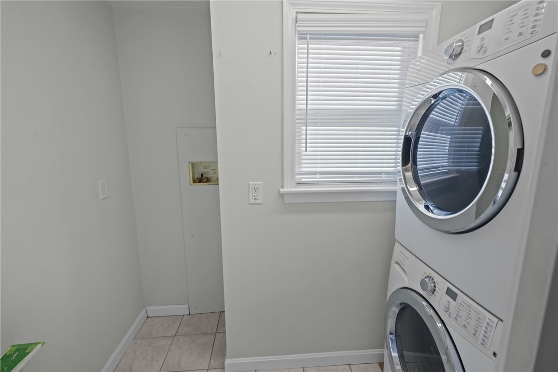 4 Read Avenue Warren, RI 02885 - Photo 13 of 39 First floor laundry- via pocket door in bathroom