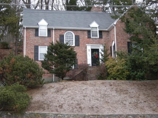259 Varick Road Newton, MA 02468 - Photo 1 of 28 a front view of a house with garden